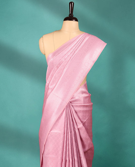 Light Pink coloured semi silk saree featuring a Silver coloured Zari Diamond design on the body, paired with a Self coloured border and matching blouse.