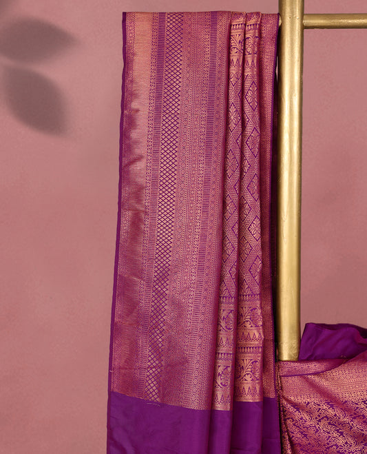 Vadamalli colour Kancheepuram saree featuring an antique zari brocade body, complemented by a traditional border and a matching blouse.