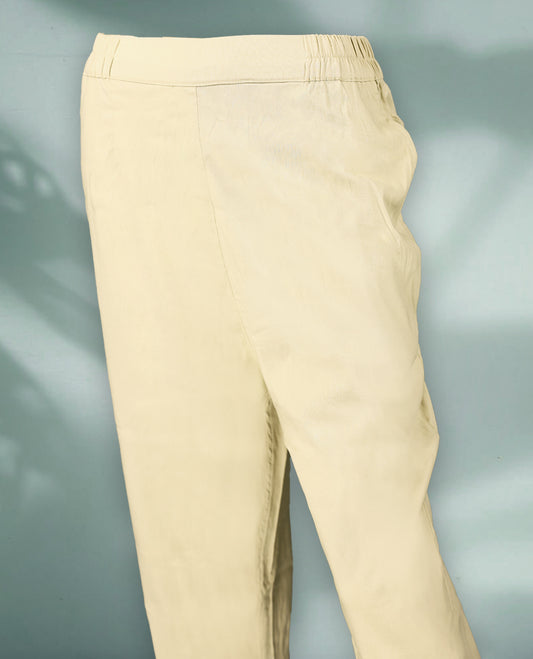 Light beige colour women's pants feature a clean, tapered silhouette with an elastic waistband and turn up hems