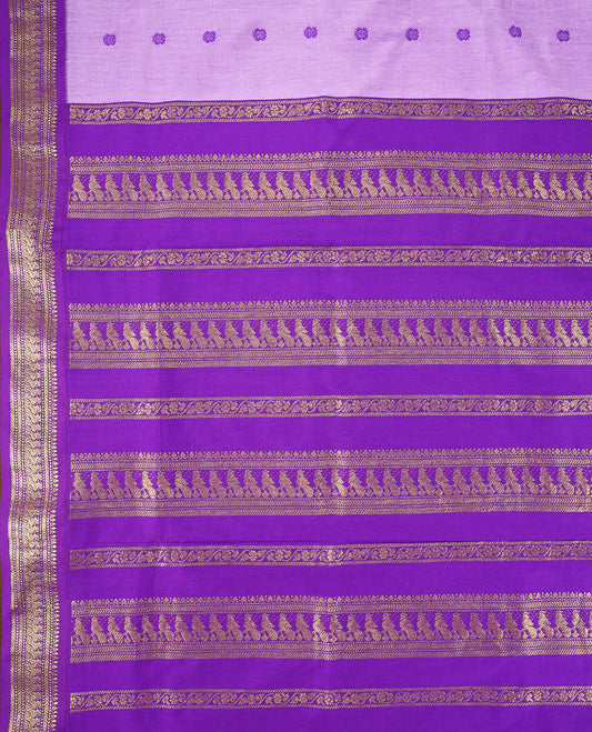 Lavender colour mixed Kalyani cotton saree featuring Purple zari motifs throughout the body, paired with Purple colour traditional border and pallu, with matching blouse