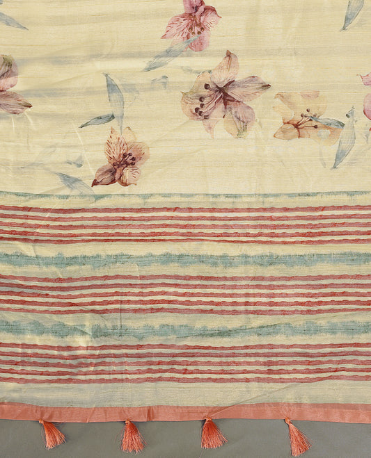 Cream colour semi silk printed saree adorned with soft Peach floral motifs across the body, finished with a Peach and green striped border, with matching blouse