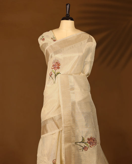 Radiant gold organza Kerala saree adorned with delicate floral Digital Prints, a shimmering zari border and a matching blouse