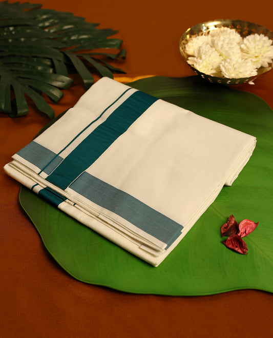 Light ivory Colour cotton single dhoti with 1.5 Inch Deep Sea Green kara, crafted for traditional elegance & comfort, for men.