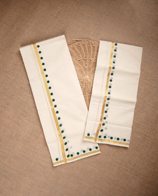 Cream colour cotton set mundu highlighting gold zari border with green colour circle print.