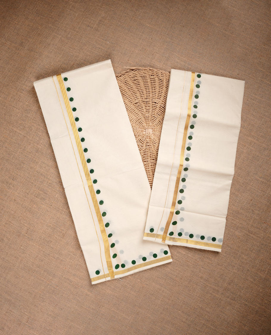 Cream colour cotton set mundu highlighting gold zari border with green colour circle print.