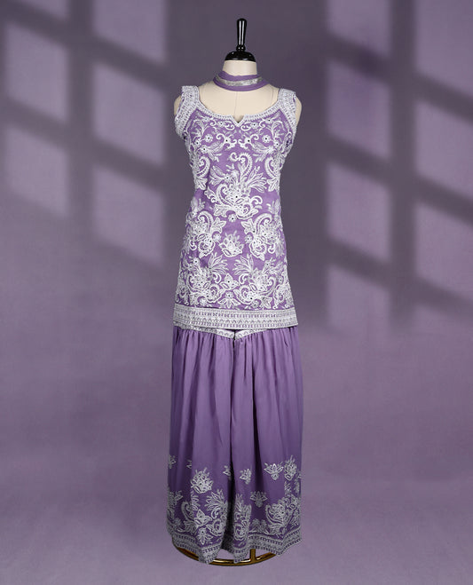 Lavender Colour sharara set features a sweetheart neck with intricate embroidery, sleeveless design, with contrast bottom and dupatta