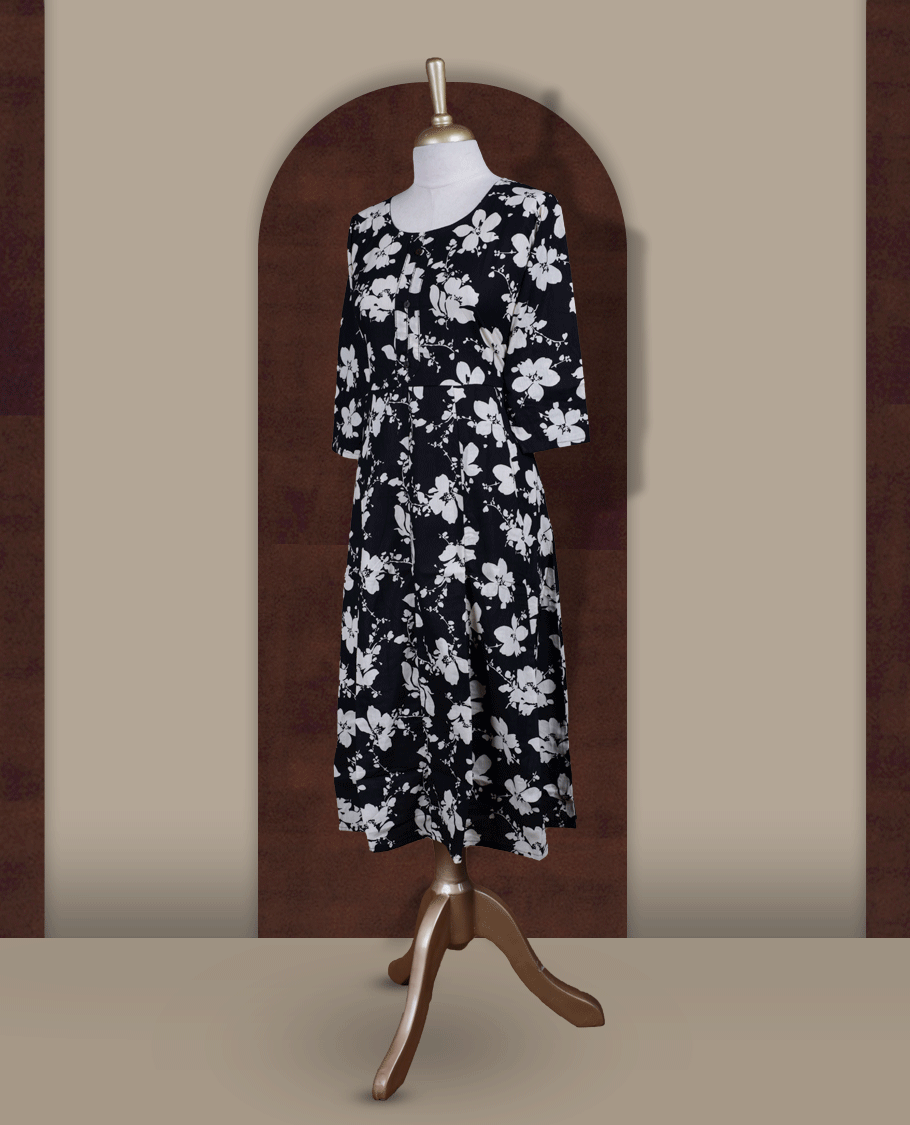 Black colour kurthi featuring with beigecolour floral prints all over & Designed with a round neckline, button placket, and 3/4 sleeves.