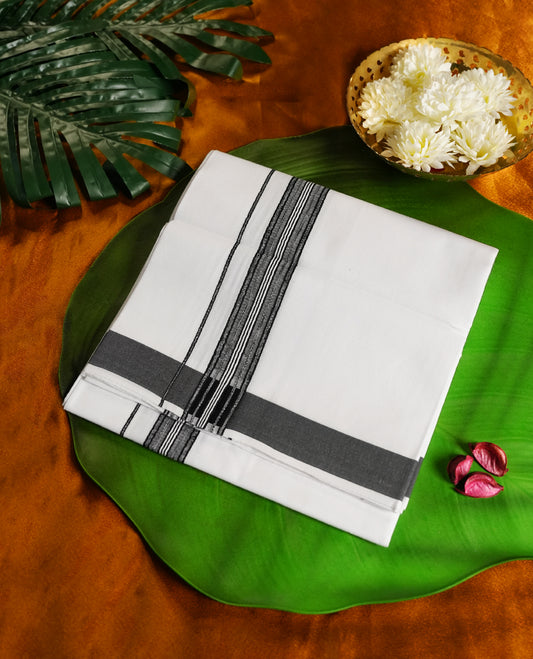 White colour cotton single dhoti featuring a bold black kara with intricate double line detailing, blending traditional elegance with everyday comfort & perfect for rituals, festivals, and cultural events.