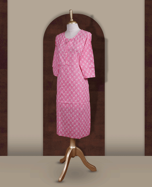 Soft pink colour kurthi with off white floral prints, crafted from soft cotton for a breezy and elegant look & styled with a round V notch neckline and comfortable 3/4th sleeves and a button down front.