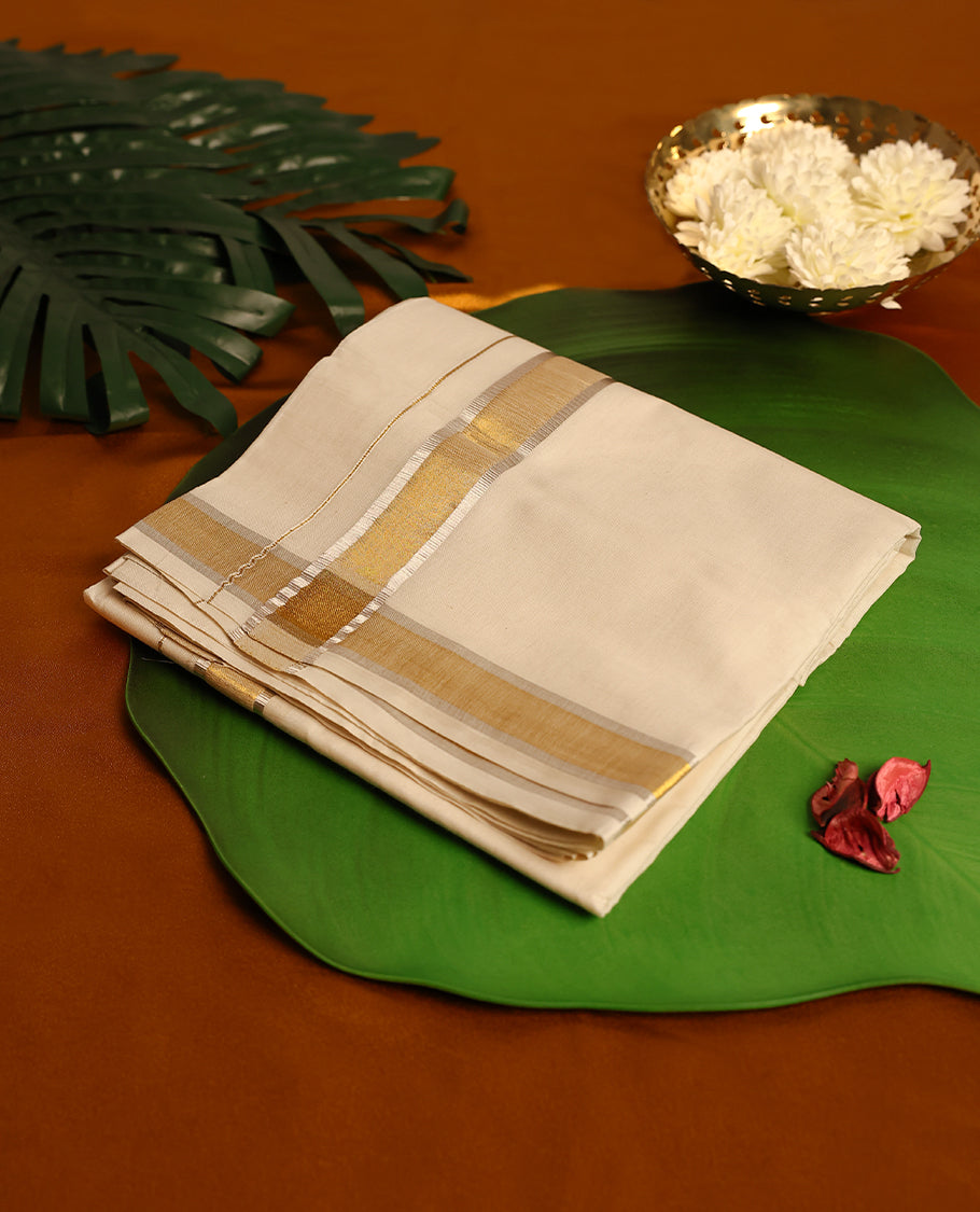 Light ivory Colour cotton double dhoti with light rose Gold and Gold kara, crafted for traditional elegance & comfort, for men.