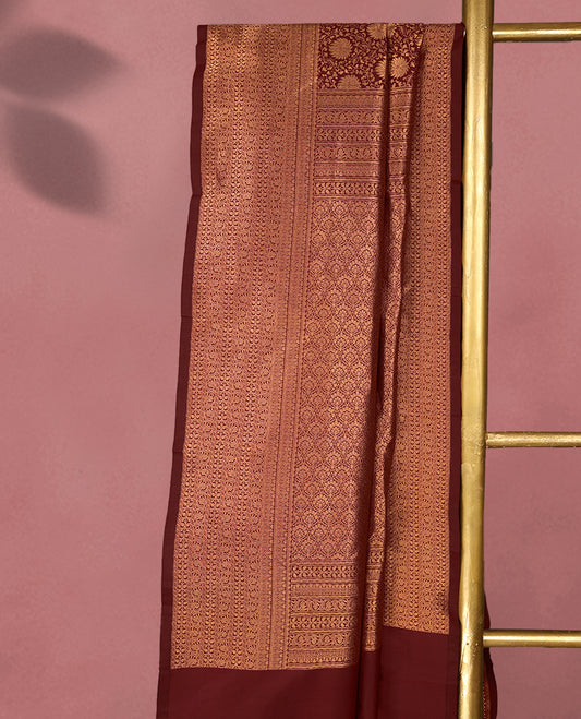 Dark Maroon Kancheepuram Silk Brocade Saree having Floral Jaal Worked Body with Self Coloured Brocade Border and Blouse