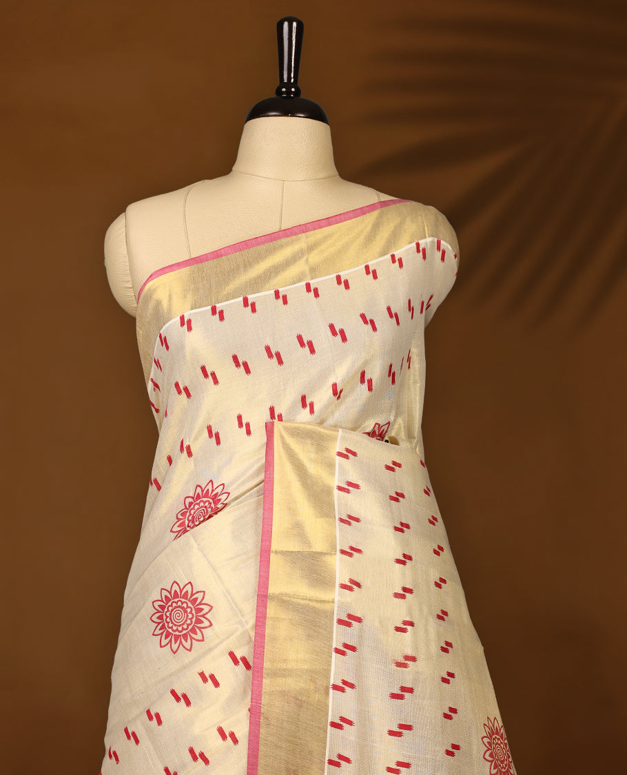 Elegant handloom soft tissue kerala saree in cream with gold zari border and pink detailing,Adorned with floral motifs and subtle stripes, paired with a matching blouse,perfect for festive and traditional occasions.