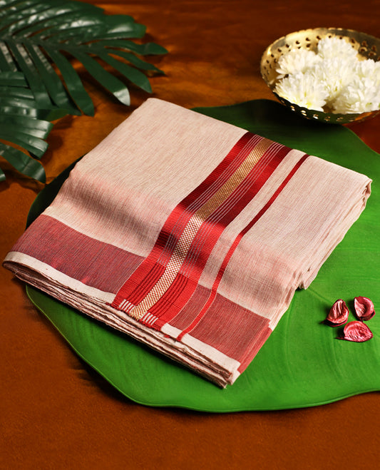 Soft brown pure handloom double dhoti featuring a rich maroon kara highlighted with golden zari and fine line detailing, woven with traditional craftsmanship for comfort, elegance, and festive occasions.