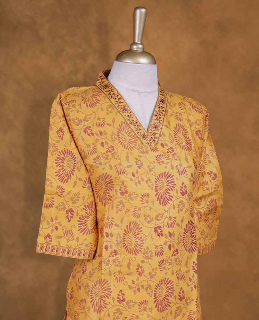Mustard colour kurti with Maroon floral prints, knee length design, styled with  thread pattern around neckline and a sleeve .