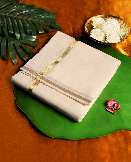 Classic off white colour pure cotton dhoti featuring a subtle golden zari border, combining comfort and tradition, perfect for festive occasions, temple visits, and cultural ceremonies.