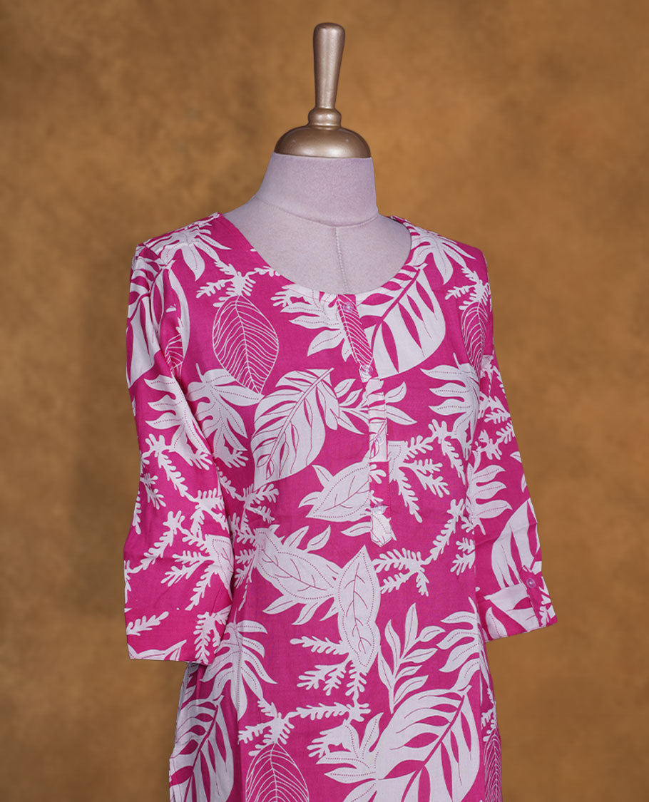 Pink colour kurti with White floral prints, knee length design, styled with a round neckline and a sleeve .