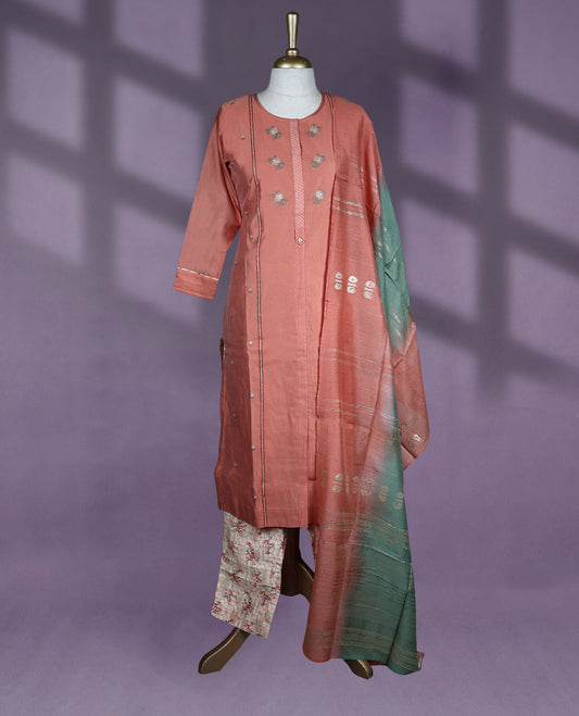 Peach colour kurti set features a round neck with placket embroidery, straight three quarter sleeves, with contrast bottom and a matching green dupatta.