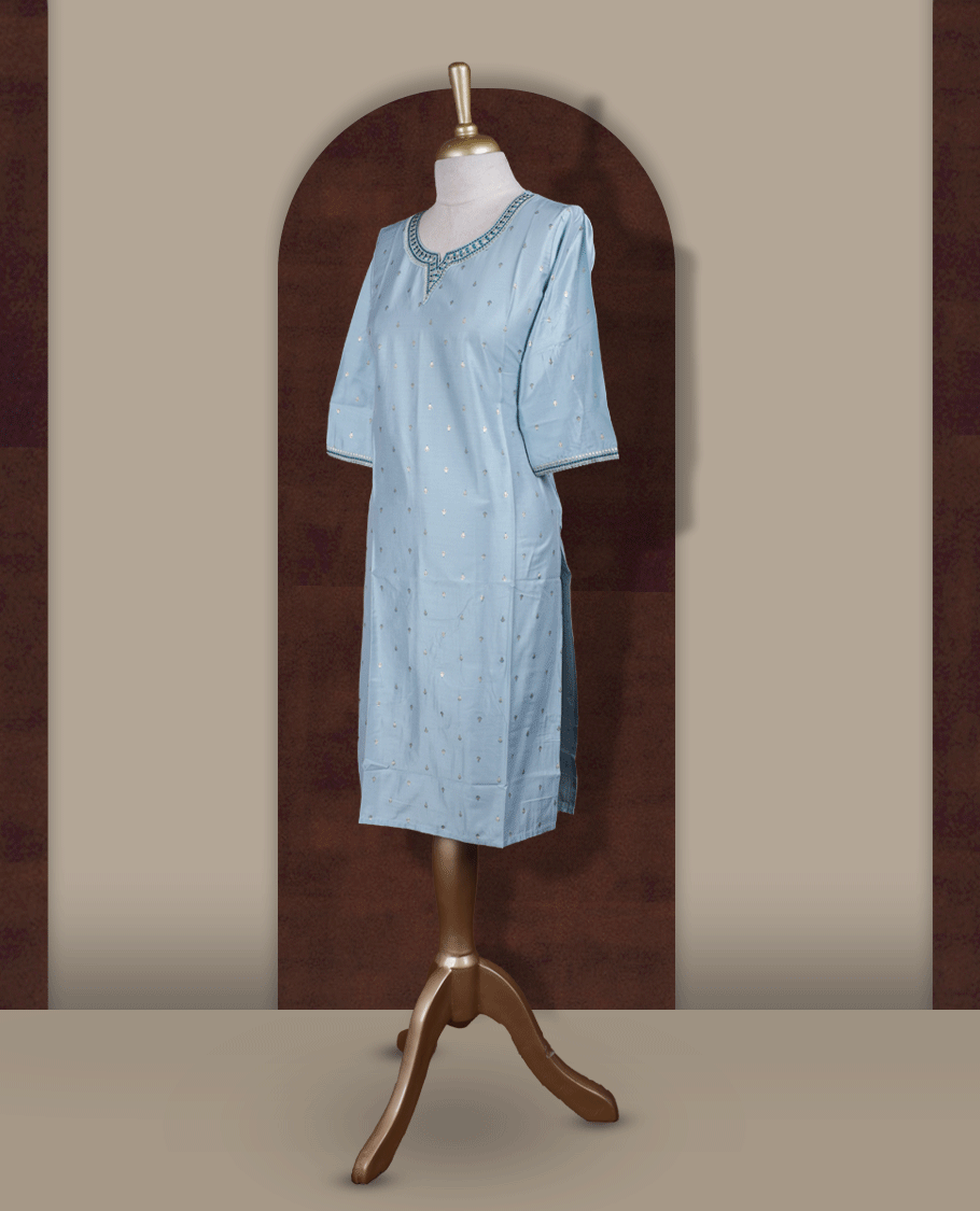 Pastel blue colour kurti from TWARA, adorned with delicate light golden & blue colour embroidery, featuring a stylish V notch neckline and comfy 3/4th sleeves.