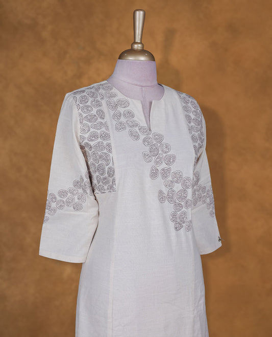 Cream colour kurti BY VISMAY with Brown floral printed motifs, straight calf length silhouette, designed with a round notch neckline and three quarter sleeves.