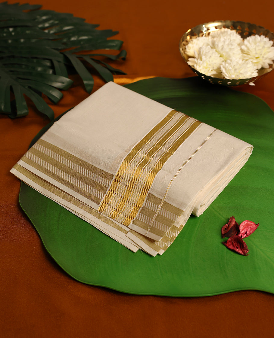 Light ivory Colour cotton double dhoti with 2 Inch Golden kara, crafted for traditional elegance & comfort, for men.