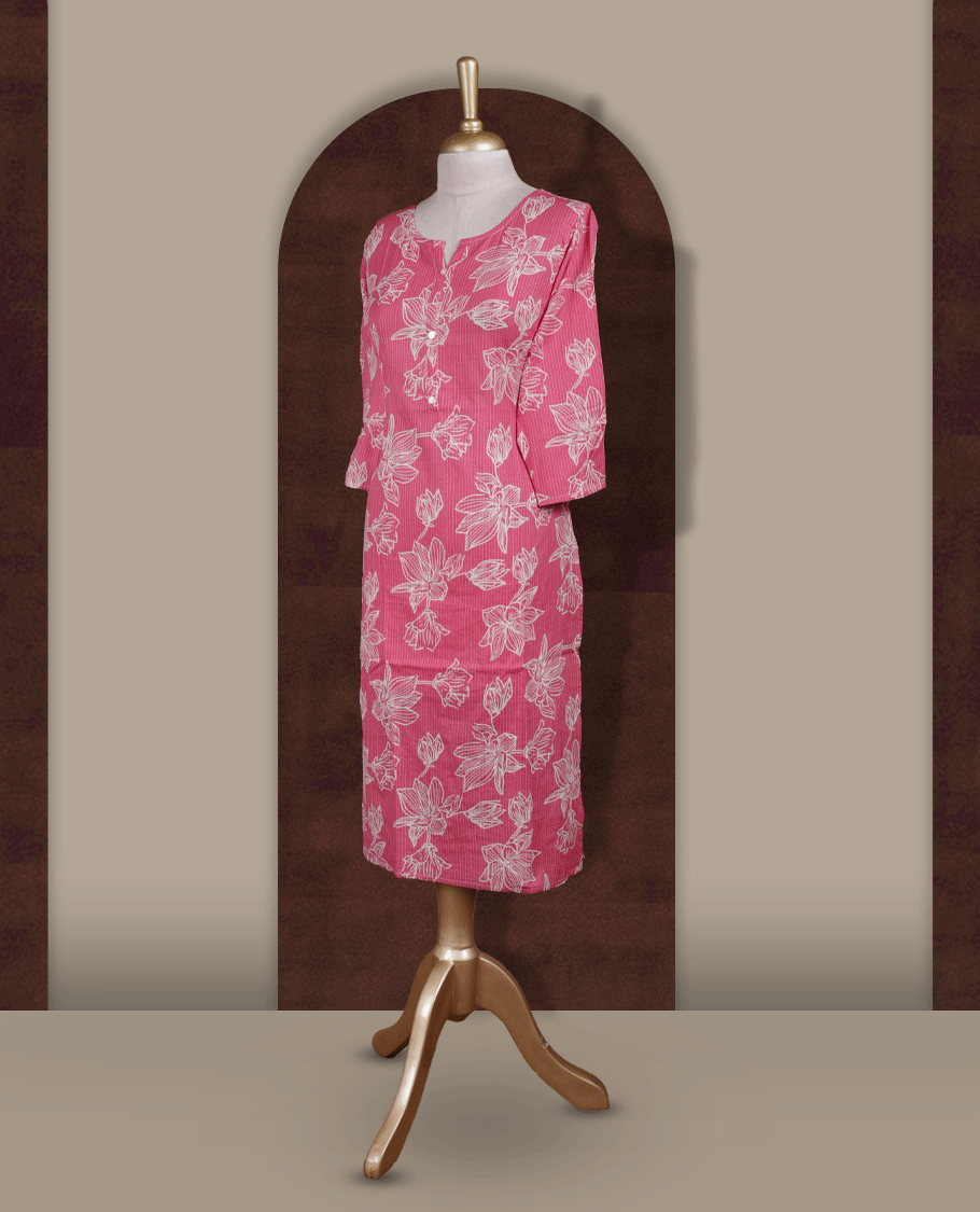 Soft pink colour kurthi adorned with delicate beige colour floral prints, featuring a stylish V notch round neckline and comfy 3/4th sleeves.