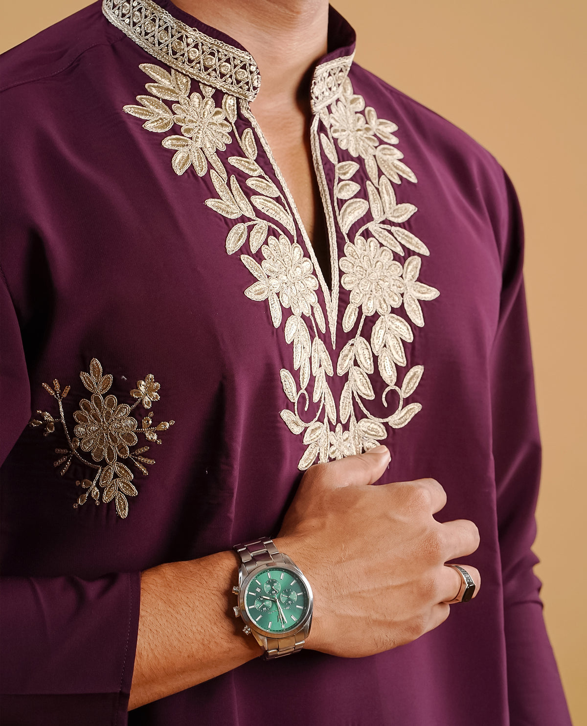 Wine colour men's kurta featuring elegant Thread work on body, complemented by sleeves for a refined and festive look.