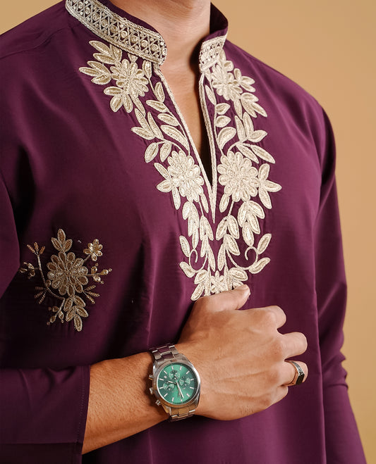 Wine colour men's kurta featuring elegant Thread work on body, complemented by sleeves for a refined and festive look.
