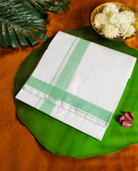 White colour cotton dhoti with a soothing green border, Lightweight, soft, and ideal for daily wear, temple visits, or traditional events & A simple yet graceful choice for a refined ethnic look.