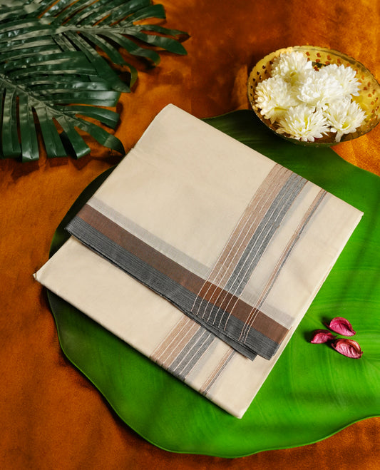 Off white colour cotton single dhoti featuring a refined light brown and grey kara with layered line detailing & Designed for daily comfort and traditional grace, ideal for rituals, cultural events, and festive wear.