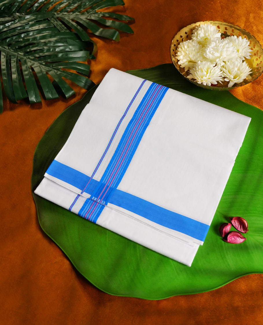 Off white colour cotton single dhoti featuring a vibrant blue kara with fine pink accents and double line detailing & crafted for daily wear and traditional occasions like poojas, festivals, and ceremonies.