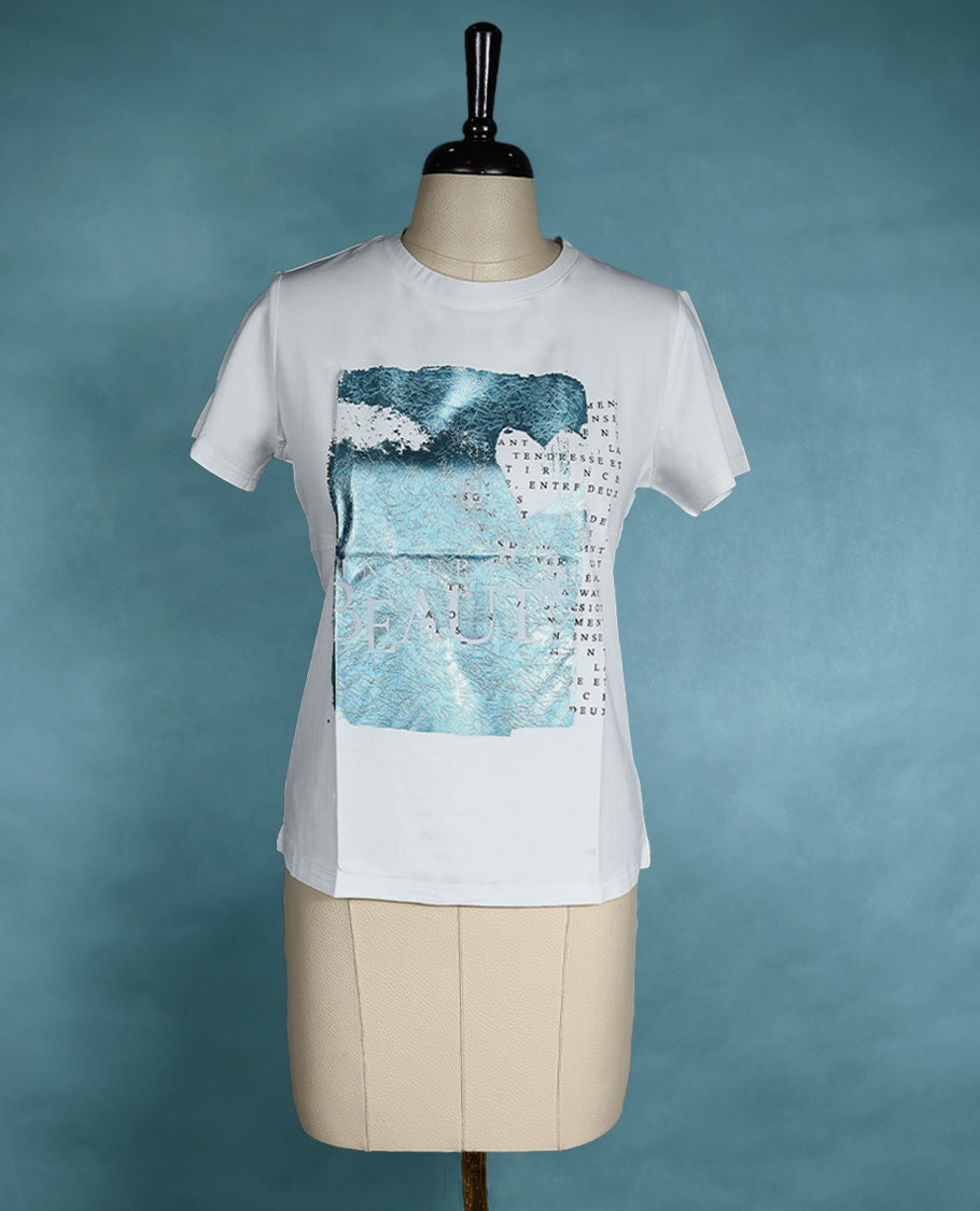 White graphic T shirt featuring a round neck and short sleeves, designed with a blue abstract print and text details for a contemporary, artistic vibe.