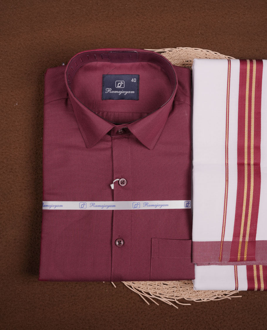 Maroon Colour shirt paired with a matching dhoti, finished with a maroon and gold border.