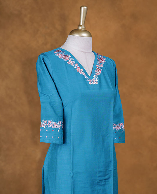 Blue colour kurti with multicolour colour thread pattern across the body, knee length design, styled with a V neckline and a  sleeve .