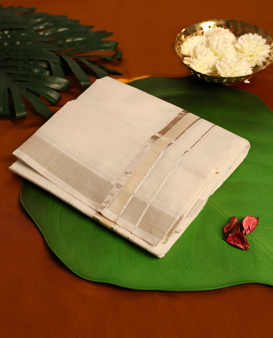 Light ivory Colour cotton single dhoti with 1.5 Inch Light rose gold & Gold kara, crafted for traditional elegance & comfort, for men.