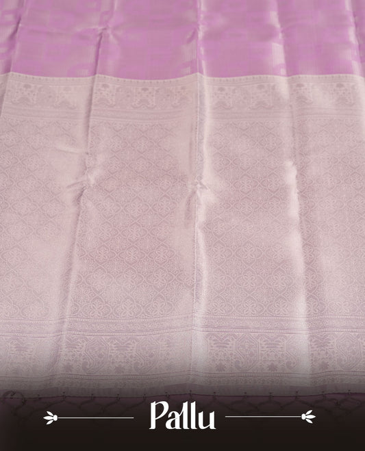 Pink colour Semi Silk Saree with Self-Checked Geometric Patterns, Contrasting Silver Zari Woven Pallu and Border with Intricate Motifs and Tassels, Paired with Coordinated Blouse Piece