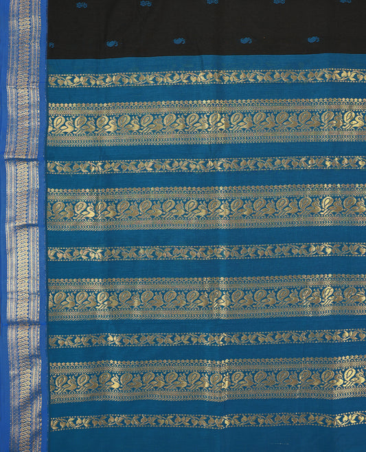 Black colour mixed Kalyani cotton saree featuring Blue zari motifs throughout the body, paired with a Blue colour traditional border and pallu, with matching blouse