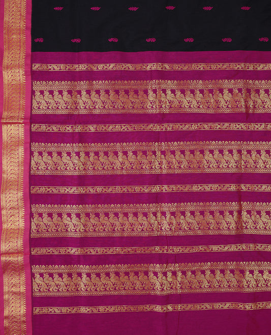Pure Black colour mixed Kalyani cotton saree featuring Magenta zari motifs throughout the body, paired with a Magenta colour traditional border and pallu, with matching blouse