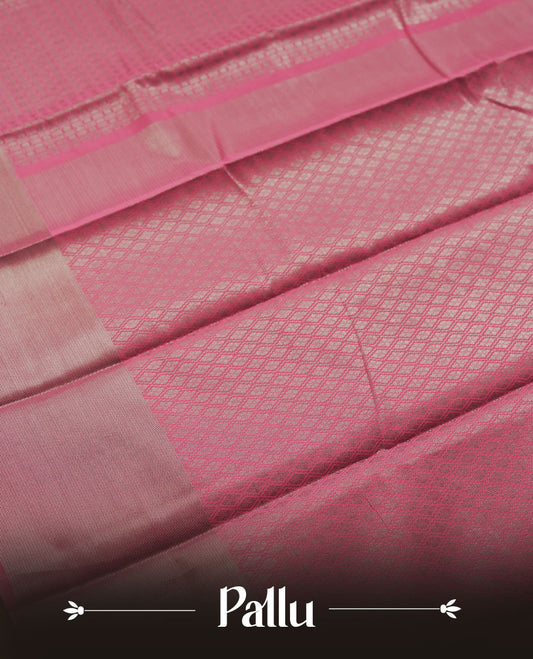 Dusty pink colour semi silk saree featuring neem zari Brocade geometric Pattern all over the body, complemented by a Self Colour woven border with detailing, Pallu & blouse.