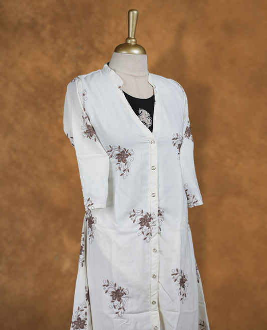 Cream floral printed nightwear shirt dress with band collar, front button placket, three-quarter sleeves, and contrast black inner layer at neckline