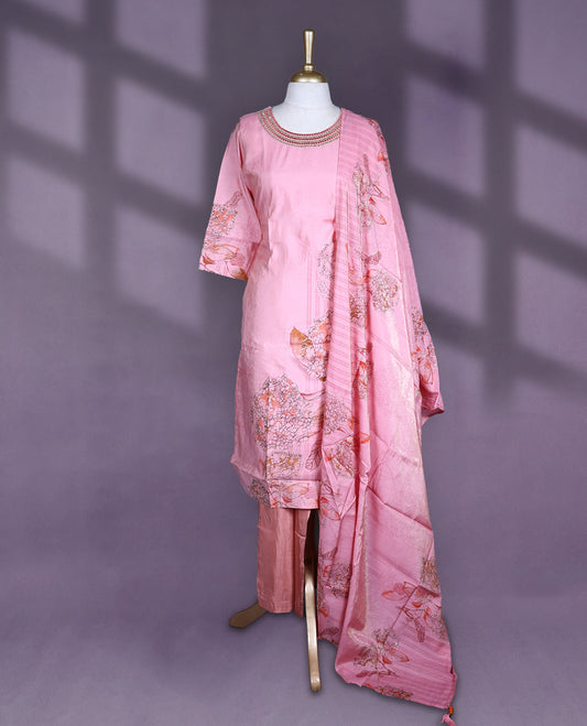 Pink colour salwar set with round neck and elbow sleeves featuring floral printed body and sleeve detail with embroidered neckline paired with matching plain bottom and floral printed dupatta