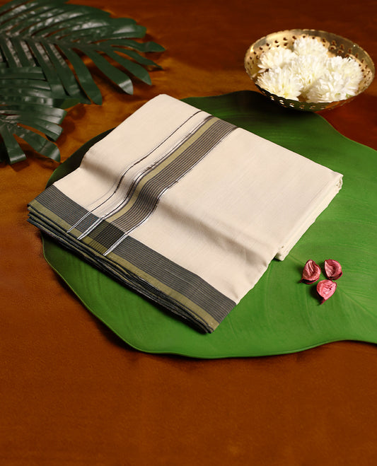 Off white colour handloom pure cotton double dhoti highlighted with an elegant grey border featuring fine stripe detailing and silver accents for a refined traditional look.