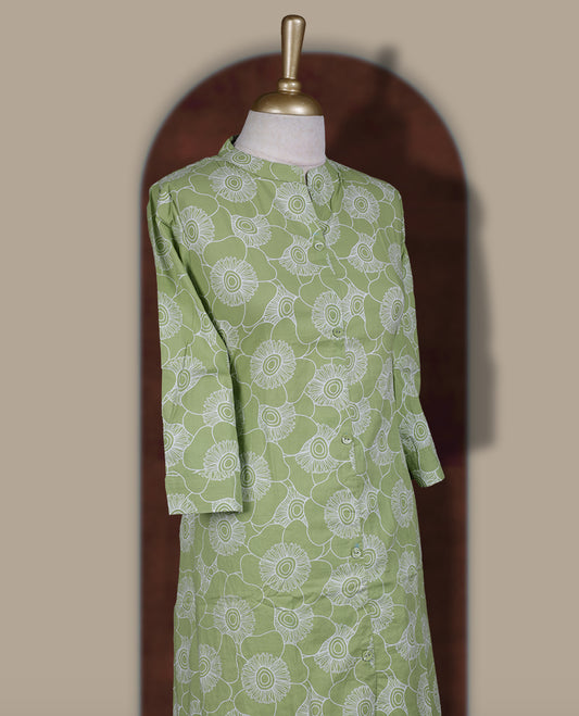 Pista green colour coord set featuring white floral prints all over, mandarin collar, front buttons and sheer 3/4 sleeves, Paired with matching pants, it offers a sleek, modern look perfect for refined casual wear.