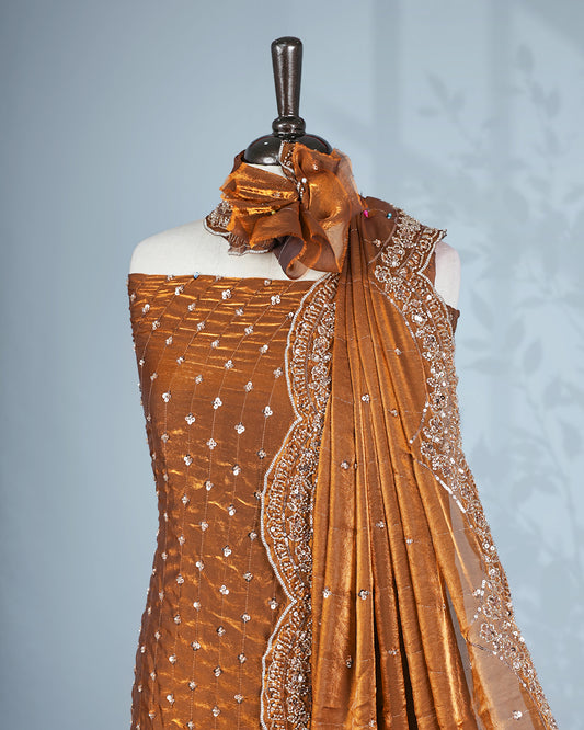 Bronze colour salwar material with Cut beats & sequins work on body, Matching Bottom & dupatta.