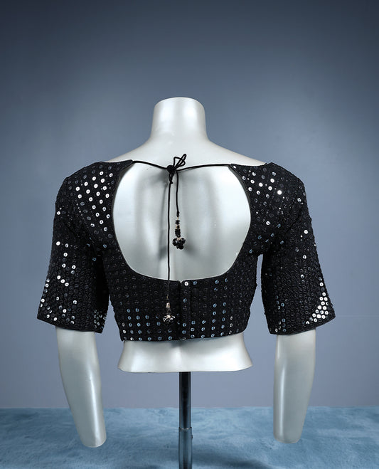 Black, sweetheart neckline and elbow length sleeves, fully embellished with shimmering circular sequins work, padded and ready to wear Blouse