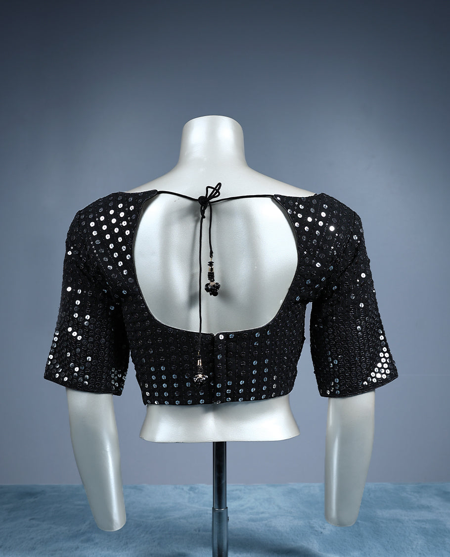 Black, sweetheart neckline and elbow length sleeves, fully embellished with shimmering circular sequins work, padded and ready to wear Blouse