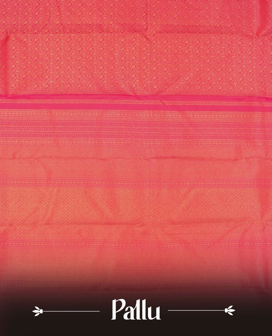Rani pink colour Kanchipuram pattern Manthrakodi saree featuring golden zari traditional pattern and floral zari jacquard with small zari motifs across the body, traditional bavanji border, and plain zari blouse piece.