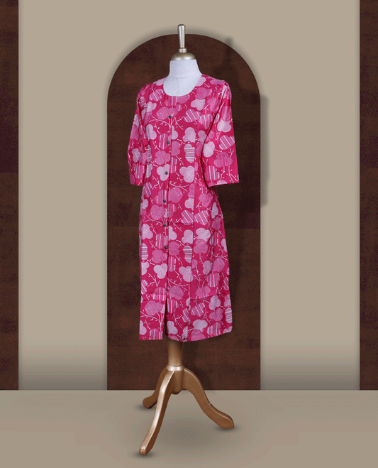 Magenta colour kurthi with off white floral prints, crafted from soft cotton for a breezy and elegant look & Features a round neckline, 3/4th sleeves, and a button down front.