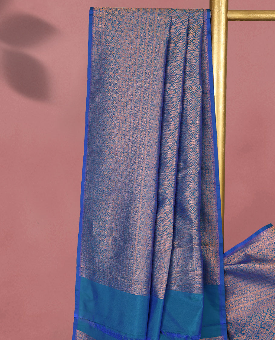 Blue colour Kancheepuram saree featuring an antique zari brocade body, complemented by a traditional border and a matching blouse.
