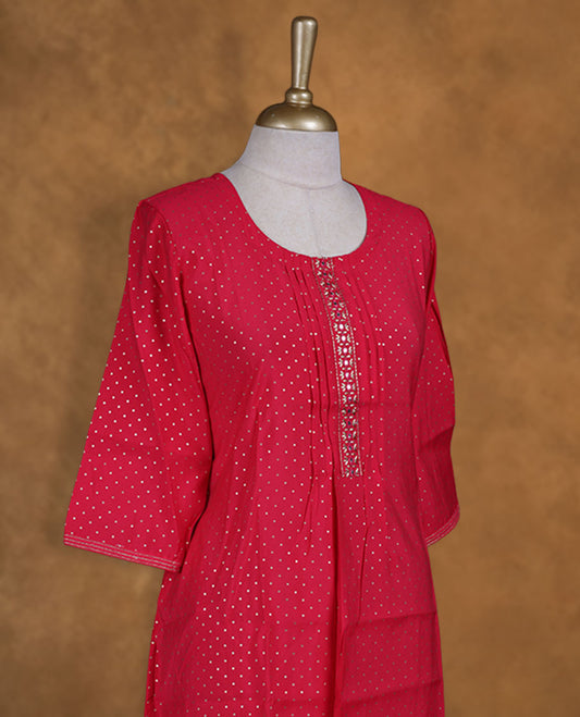 Rose pink colour kurti from TWARA, detailed with gleaming gold polka dots, featuring a scoop neckline with pintucked yoke and embellished placket, finished with relaxed 3/4th sleeves.