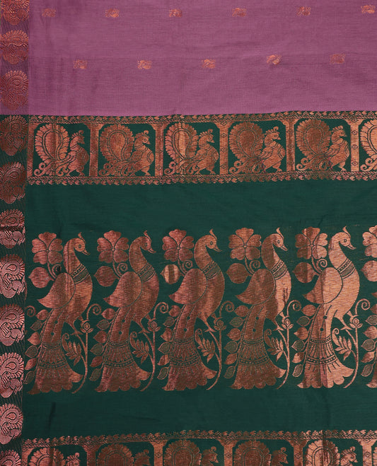 Lavender pink and Dark Green Kalyani cotton saree featuring intricately woven golden peacock and paisley motifs across the border and pallu, highlighted with a zari finish, and paired with a matching blouse.